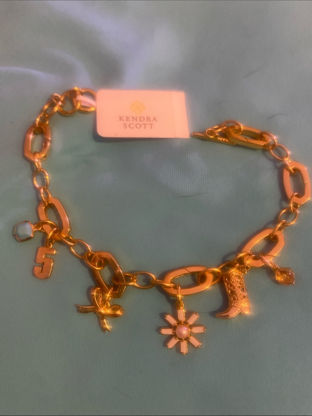 Kendra Scott Gold Charm Bracelet with Pink Daisy and Mixed Charms